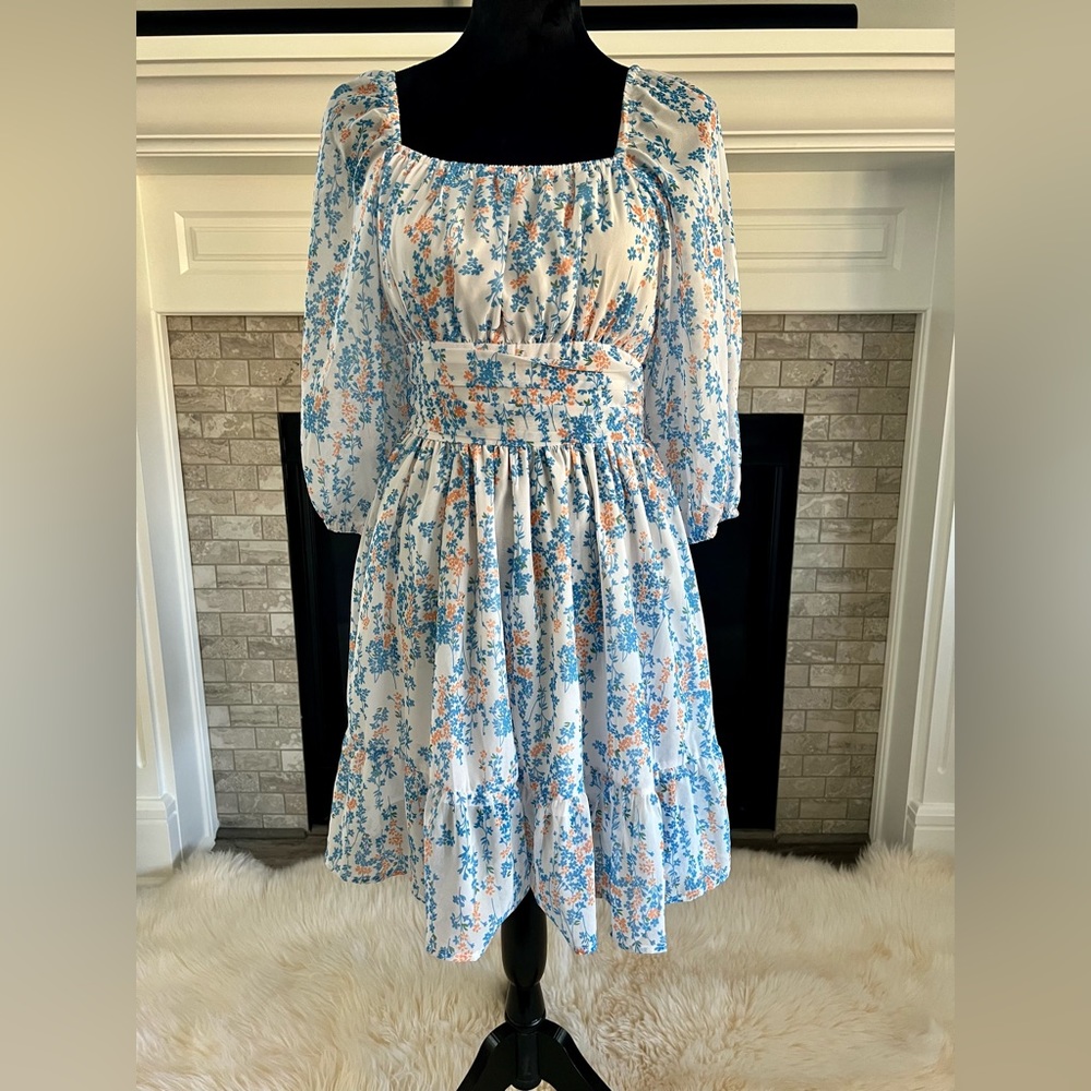 Floral dress! Worn once for a wedding. Cute tie back.